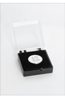 White button badge with needle fastener in a gift box