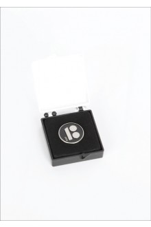 Black button badge with needle fastener in a gift box