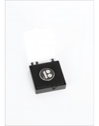 Black button badge with needle fastener in a gift box